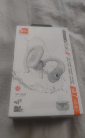 Cambio/ Vendo audífonos JBL Endurance Peak 3 Nuevos por municiones/magazine, Venta de Armas de fuego en PR