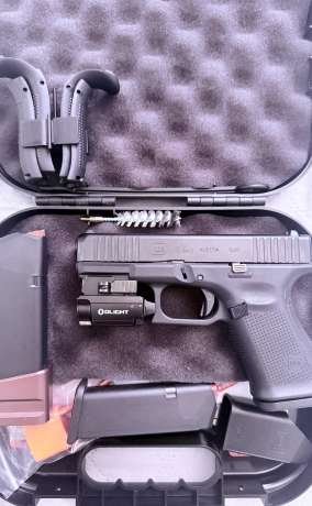 Glock 19 Gen 5+ oligh mini + laser verde, 3 magazine originals + uno con extensión a 21, Armas de fuego en PR