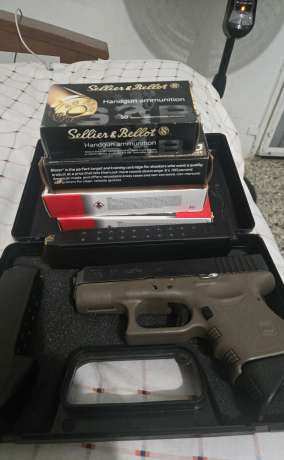 Glock 27 .40 en buenas condiciones viene con 3 magasin una de 9 otra de 15 y otra de 22 municiones y viene con 4 caja de municiones solo a sido disparado 2 veces soy de Isabela., Venta de Armas de fuego en PR